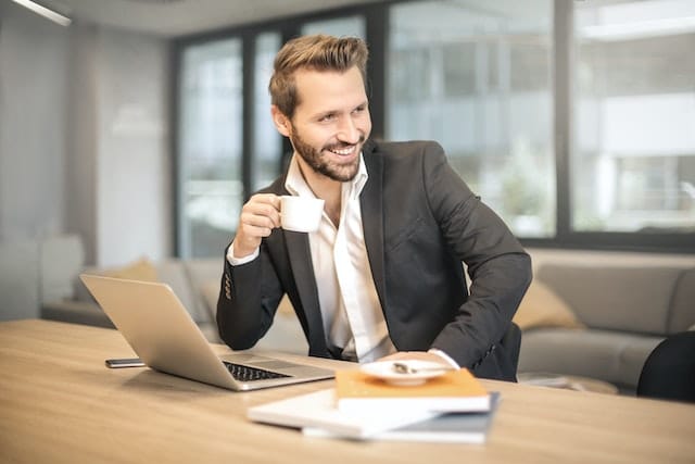 Photo by Andrea Piacquadio: https://www.pexels.com/photo/man-holding-white-teacup-in-front-of-gray-laptop-842567/ - client presentation