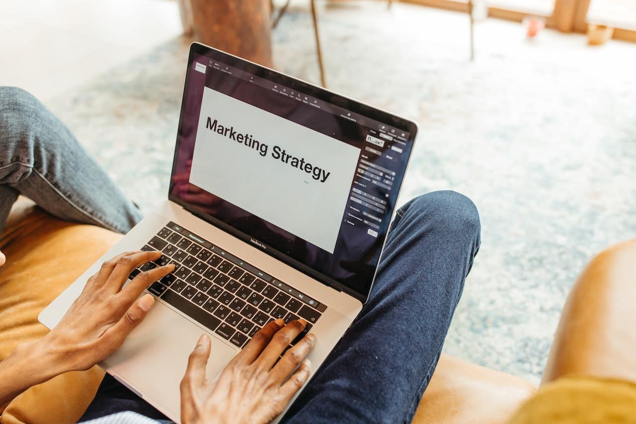 Photo by Anastasia Shuraeva: https://www.pexels.com/photo/person-using-a-laptop-7279706/ -- event marketing