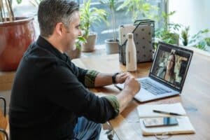 https://www.pexels.com/photo/man-on-a-video-call-7245797/