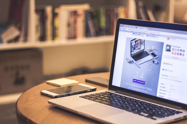 Photo by Tranmautritam: https://www.pexels.com/photo/silver-laptop-computer-beside-white-smartphone-on-brown-wooden-table-69432/ -- website