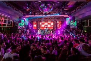 Photo by Edoardo Tommasini: https://www.pexels.com/photo/people-inside-a-club-2034851/ -- event venue