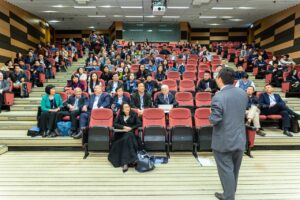  Image Title: Narratives of Networking Image Description: A speaker on stage talking to an audience Alt Text: Speaker Symphonies Source: https://www.pexels.com/photo/man-standing-in-front-of-people-1709003/