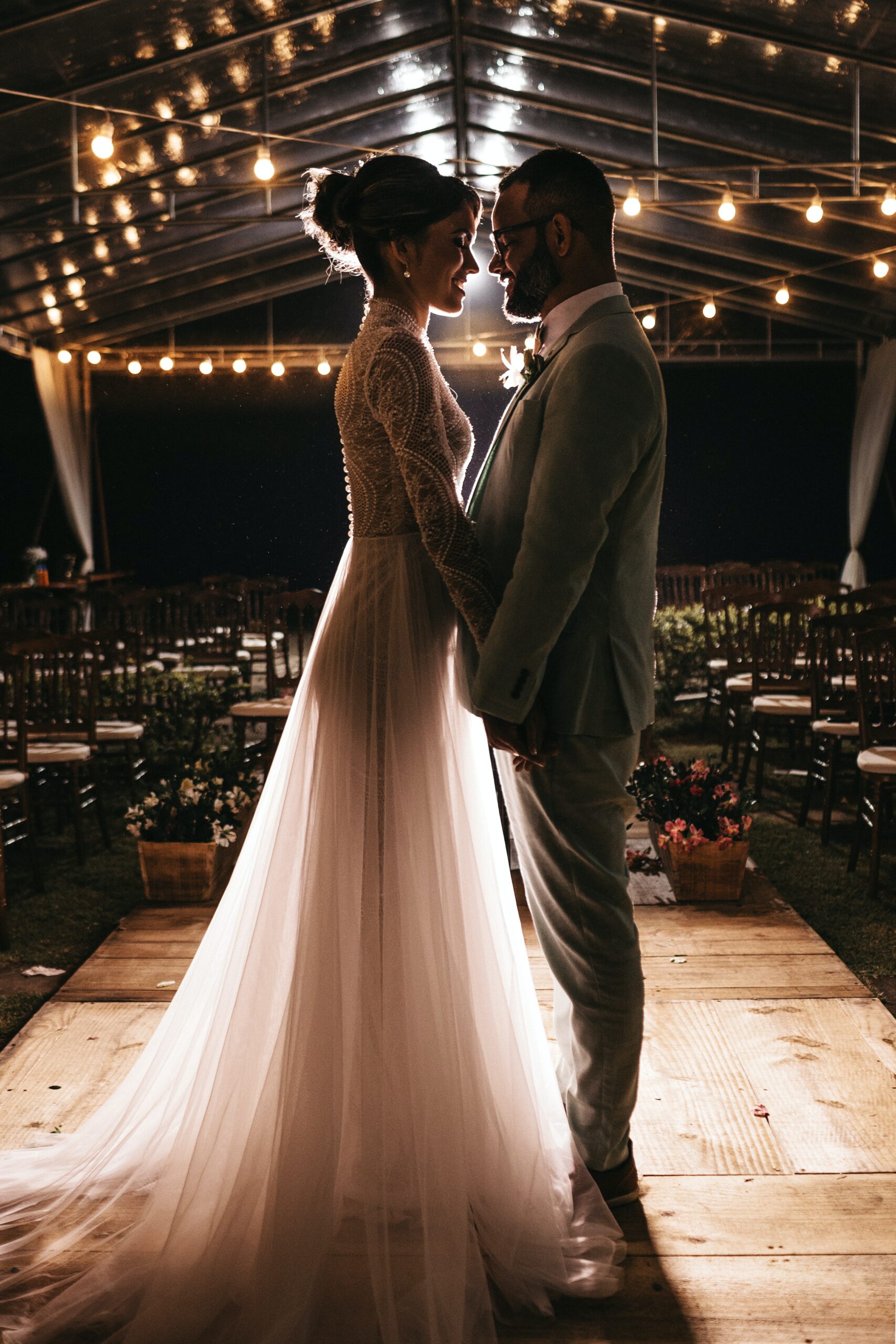 Wedding DJ Photo by Jonathan Borba: https://www.pexels.com/photo/man-standing-in-front-of-woman-in-white-wedding-dress-3014856/