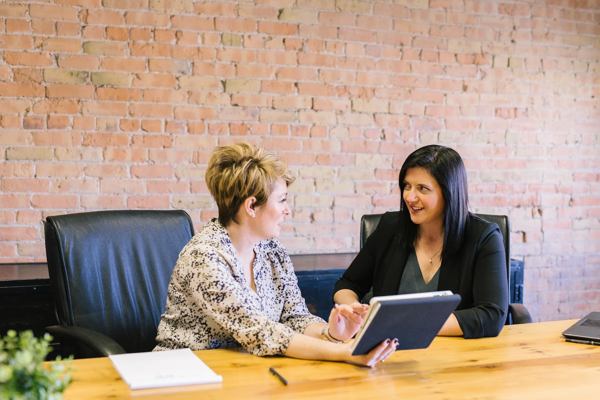Photo by Amy Hirschi on Unsplash -- sales call meeting
