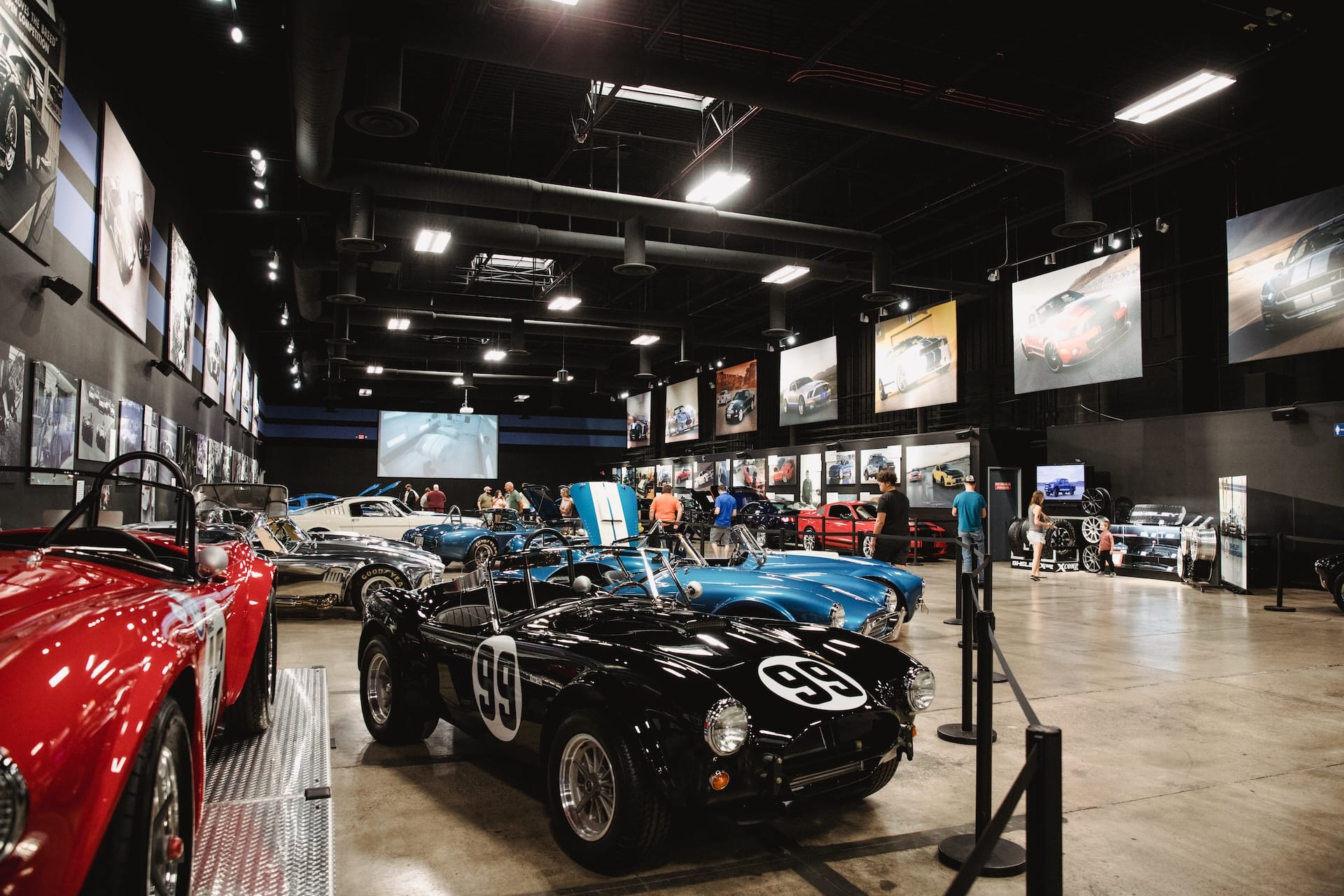 Image Title: trade show event Alt Text: An automotive industry trade show. Source: https://unsplash.com/photos/different-vehicles-in-a-car-show-inside-building-YeZR-enMLzs