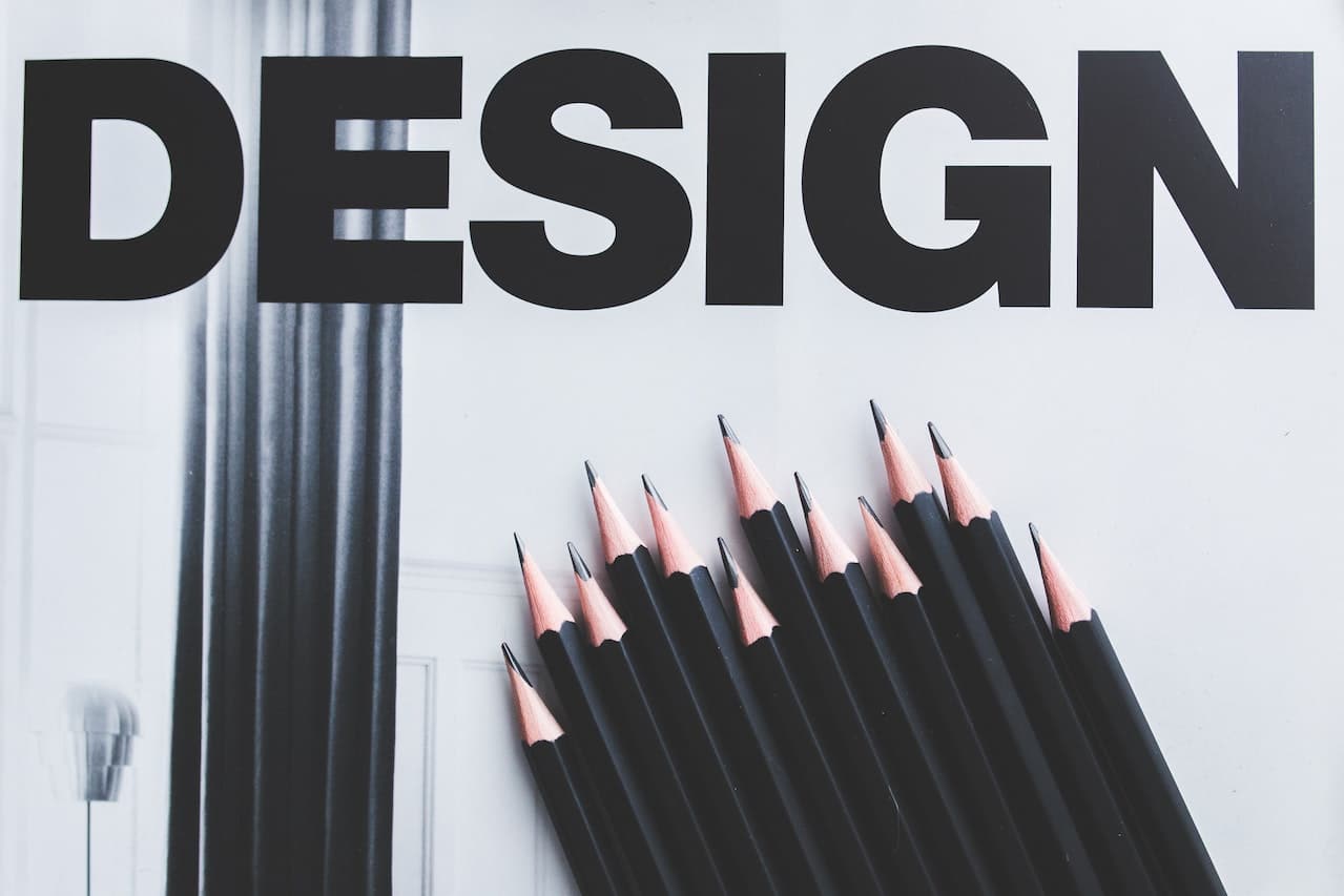 Photo by Kaboompics .com: https://www.pexels.com/photo/black-pencils-and-design-word-6444/ -- brand design