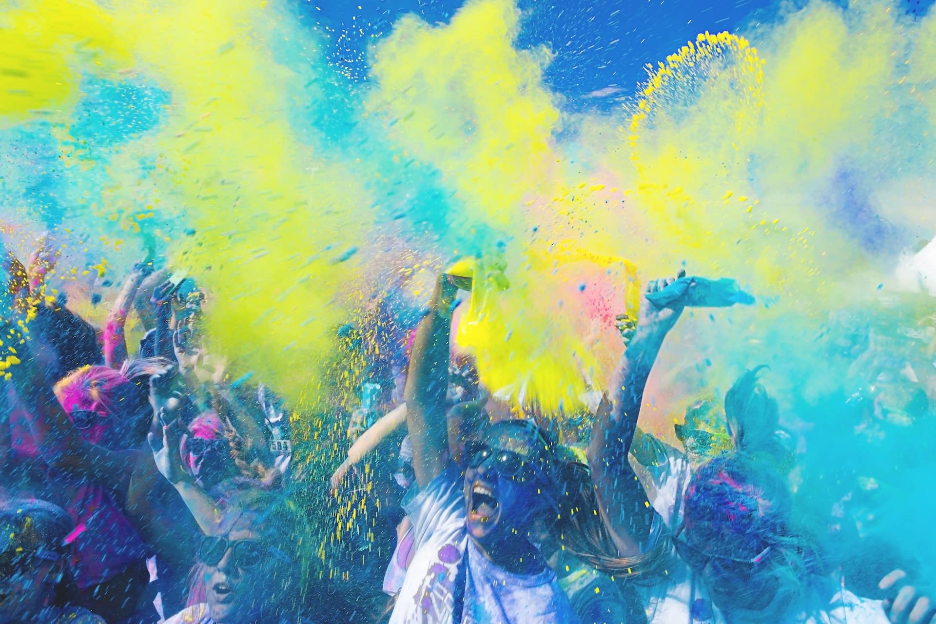 Photo by Adam Whitlock on Unsplash -- vibrant color people