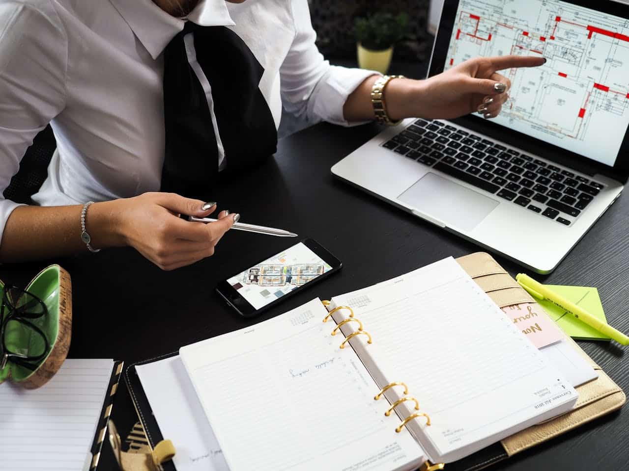 Photo by energepic.com from Pexels: https://www.pexels.com/photo/person-pointing-on-the-screen-of-a-laptop-313691/ -- event logistics