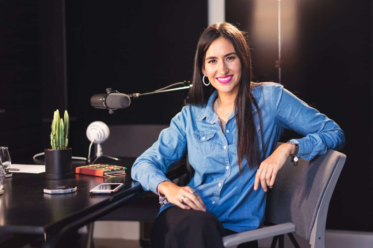 Photo by Los Muertos Crew: https://www.pexels.com/photo/woman-sitting-on-a-chair-wearing-denim-top-7586547/ -- business podcast