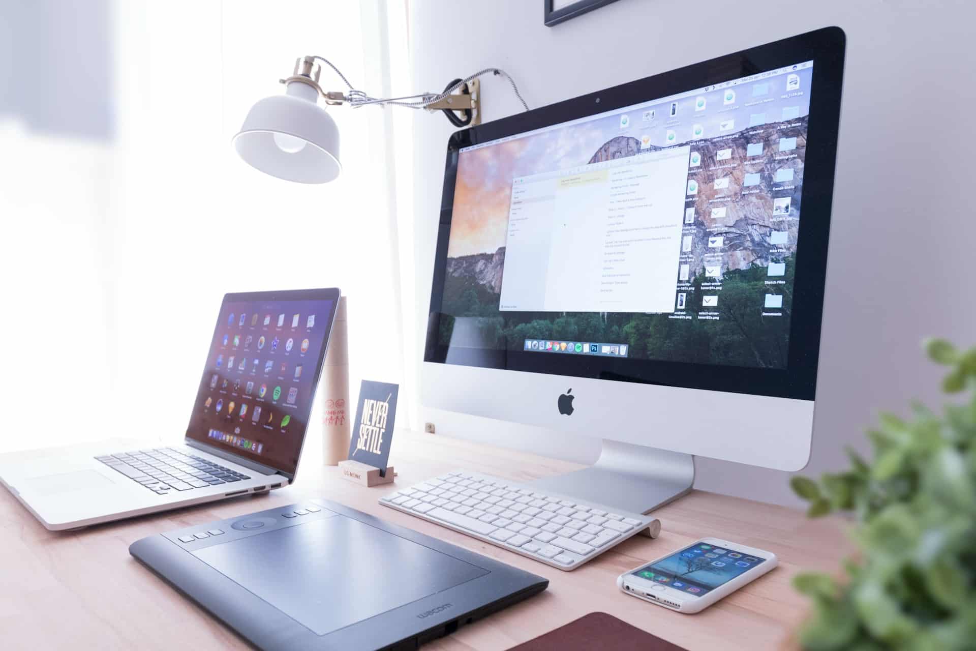 Photo by Domenico Loia on Unsplash https://unsplash.com/photos/silver-imac-near-iphone-on-brown-wooden-table-EhTcC9sYXsw - marketing strategy