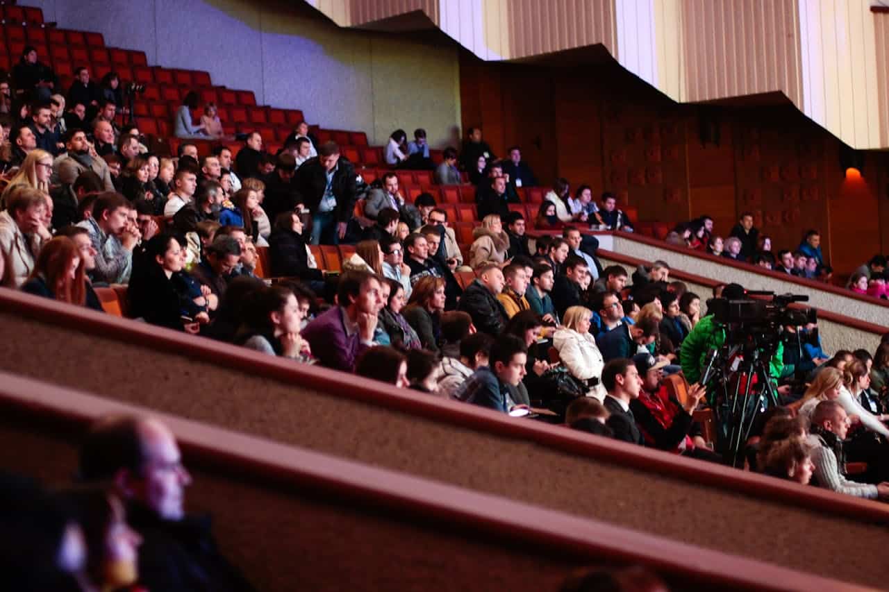 Photo by John-Mark Smith: https://www.pexels.com/photo/people-sitting-watching-in-the-theater-301987/ -- event marketing