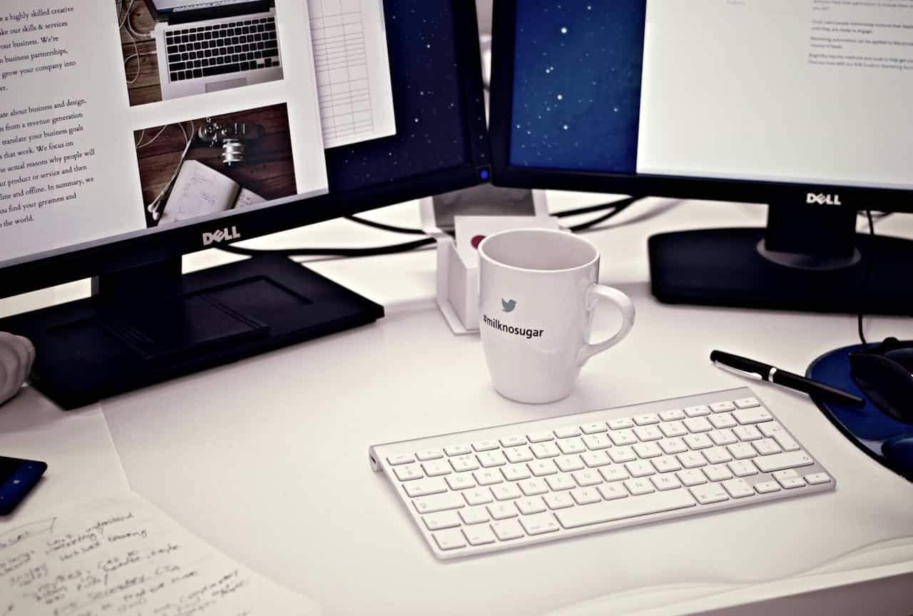 Photo by Picography: https://www.pexels.com/photo/white-ceramic-mug-between-apple-magic-keyboard-and-two-flat-screen-computer-monitors-4458/ -- blogging