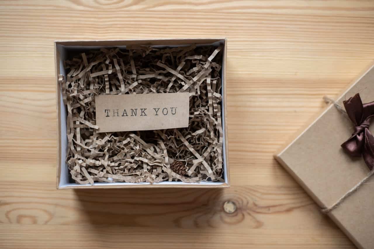 Photo by Monstera Production: https://www.pexels.com/photo/cardboard-gift-box-with-postcard-on-table-5957128/