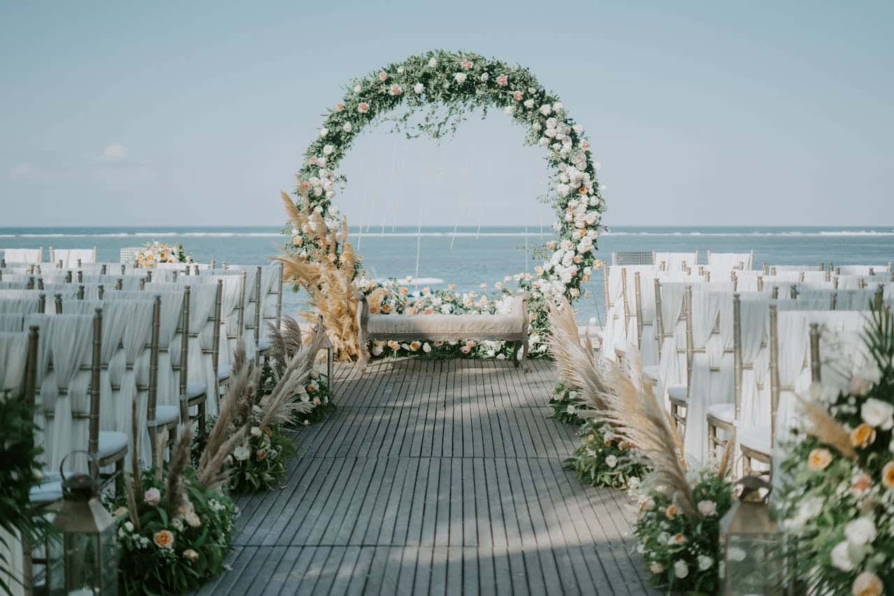 Photo by Agung Pandit Wiguna: https://www.pexels.com/photo/photo-of-floral-arch-during-daytime-2788494/ 