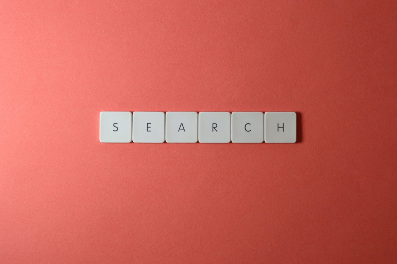 Photo by Miguel Á. Padriñán: https://www.pexels.com/photo/close-up-shot-of-keys-on-a-red-surface-2882652/