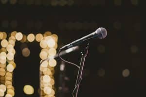 https://www.pexels.com/photo/selective-focus-photography-of-microphone-on-microphone-stand-1745762/ Photo by Dome Dussadeechettakul on Pexels