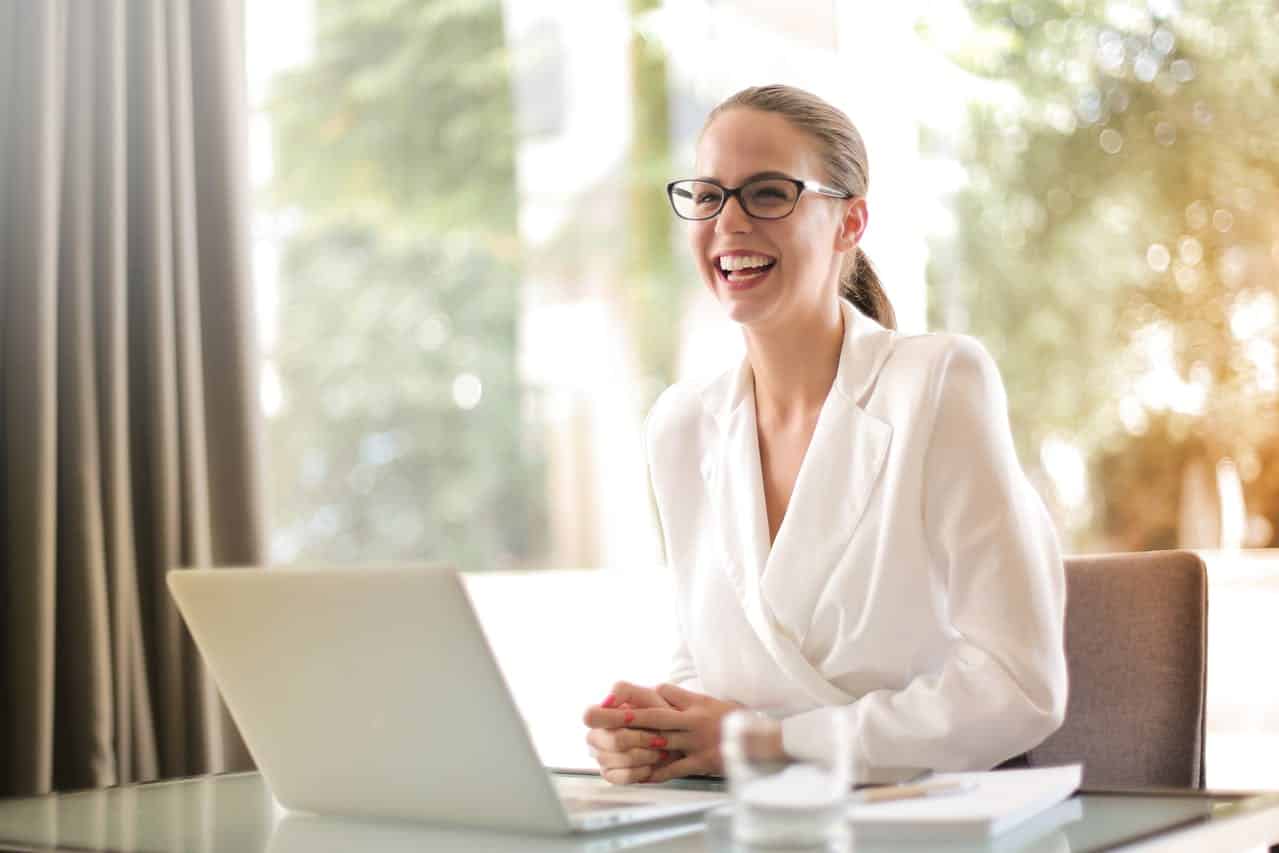 Photo by Andrea Piacquadio: https://www.pexels.com/photo/laughing-businesswoman-working-in-office-with-laptop-3756679/ -- executive assistants