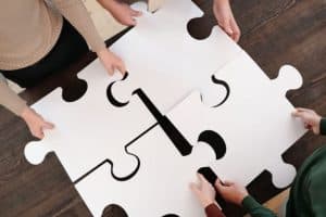 Photo by Diva Plavalaguna: https://www.pexels.com/photo/close-up-photo-of-people-holding-puzzle-pieces-6147381/ 
influencer partnership